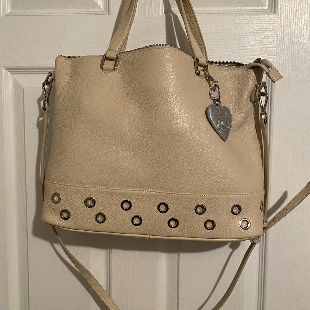Brand new Celine Dion bag! Creamy leather with grommet detail!